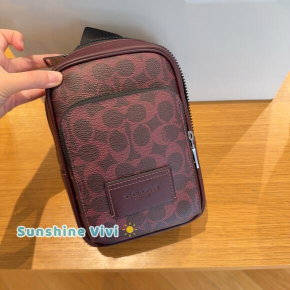 NWT Coach men's Racer Sling Pack In Signature Canvas CV763 Black Currant - Picture 1 of 4